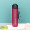 Taza de Agua Esmerilada Transfronteriza Taza de Plástico Portátil 750ml Hervidor de Agua con Popote de Rebote Cuerda de Correa Taza Deportiva Resistente a Altas Temperaturas
