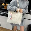 Bolsa Tote para Mulheres 2026 Nova Bolsa de Grande Capacidade para o Dia a Dia Bolsa de Ombro Versátil de Verão Bolsa de Ombro da Moda com Borda de Renda