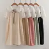 26019 Conjunto de dos piezas para mujer: falda con tirantes de retazos de encaje fresca y dulce + camisa blanca de manga corta con cordones