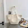 Bolsa tote grande de outono/inverno transfronteiriça nova para mulheres, bolsa de ombro simples e fashion 2026, adequada para trabalho e deslocamento, e pode ser carregada sob o braço