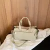 Nova coleção de outono: bolsa feminina versátil que pode ser carregada na mão ou usada como bolsa transversal, apresentando múltiplos compartimentos, um design leve e um estilo simples e casual adequado para o uso diário e para ir ao trabalho.