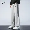 Pantalones de chándal casuales de pierna recta holgados con forro polar para hombre, pantalones nuevos 2025 Otoño e Invierno, pantalones largos gruesos versátiles