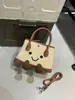 Nova Bolsa de Pelúcia com Rosto Sorridente Super Popular Outono/Inverno 2026, Design Único, Bolsa de Boneca Transversal, Bolsa de Mão para o Dia a Dia