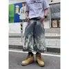 Shorts cortos de mezclilla desgastada con estampado de rayo estilo callejero americano para hombres y mujeres, de alta costura, por encima de la rodilla, de longitud media, holgados, de pierna ancha, modernos