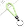 Llavero Colgante de Cuero PU Trenzado para Coche Anillo Muñeco de Dibujos Animados Cuerda Trenzada Pareja Hombre y Mujer Accesorios de Llavero de Alta Gama