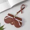 Estuche para Gafas al por Mayor de Fábrica en Stock, Caja de Almacenamiento Hecha a Mano de Cuero con Hebilla Magnética, Estuche Suave con Botón a Presión, Se Puede Personalizar con Logo, Envío Gratis