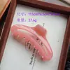 Pinza de garra grande elegante de gelatina translúcida hueca de alta gama estilo francés, simple y versátil para cabello grueso, pinza para el cabello de la nuca, pinza de tiburón