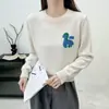 Suéter de punto suave y pegajoso con cuello redondo bordado de dibujos animados para mujer 2026 Otoño/Invierno nuevo estilo holgado perezoso que reduce la edad
