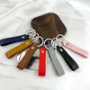 Llave de metal de cuero artificial PU doble cara de cuero -2 cuero pequeño llavero de regalo anillo de metal colgante simple 6g