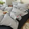Juego minimalista de cuatro piezas, funda de edredón individual a rayas de algodón 100% teñido en hilo, lavada, juego de tres piezas para dormitorio con sábana bajera