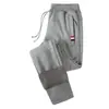 Calças grossas forradas de lã masculinas, calças esportivas largas e casuais plus size, calças de moletom da moda para atividades ao ar livre, calças retas