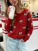 Cárdigan de punto jacquard estilo pastoral transfronterizo 2026 otoño e invierno cuello redondo estilo casual cárdigan de punto grueso para mujer