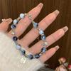 Pulseira de Borla de Porcelana Azul e Branca Estilo Xiaohongshu Antiga com Borla de Borboleta para Mulheres Novo Estilo Chinês Cerâmica Nicho Joia de Mão de Luxo Leve Atacado