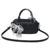 Bolso Sense de alta gama para mujer, primavera y verano, combinable, nuevo bolso bandolera de moda 2025, bolso de bolos Boston portátil e informal.