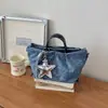 Bolso de Mano de Mezclilla Simple Casual Estilo Coreano para el Trabajo y los Viajes Diarios, Nuevo Bolso Cruzado Versátil Tipo Dumpling para Mujer 2026