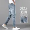 Jeans cropped de seda gelada de alta qualidade para homens, corte justo, calças finas de Tencel stretch 9 pontos para o verão 2026