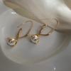 Pendientes de mariposa con perlas y diamantes incrustados en plata, bonitos pendientes de moda para mujer, combinables con todo, con personalidad y temperamento, de alta calidad.
