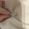 Nuevo anillo de diamante con forma de huevo y brazo retorcido para mujer, elegante, de lujo ligero, nicho, alta gama, simple, versátil, anillo ajustable