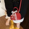 Bolsa Satchel de Nicho com Laço para Mulheres 2025 Nova Moda Primavera e Verão Bolsa Concha com Textura Bolsa Transversal Versátil