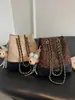 Bolso moderno y a la moda, sensación de nicho de alta gama, bolso de axila para mujer, nuevo bolso de hombro retro versátil para mujer otoño 2026