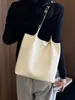 Elegante bolso de mujer 2026 nuevo modelo tejido moda bandolera para el día a día gran capacidad textura simple bolso de mano