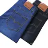 Pantalones vaqueros rectos holgados para hombre de la fábrica Guangzhou Yuanjin para otoño e invierno con forro polar, Pantalones largos de trabajo para hombre
