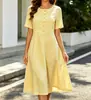 En stock 2026 nuevo vestido de trabajo elegante de cuello redondo, manga corta, abotonado, que ciñe la cintura, línea A, transfronterizo europeo y americano, comercio exterior