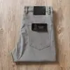 Estación Europea Verano Delgado Tencel Algodón Sarga Transpirable Lavado Elástico Recto Cinco Bolsillos Hombres Pequeño Recto Pantalones Casuales