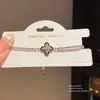 Pingente Flor Trevo da Sorte em Zircônia Pulseira Tipo Puxar Simples Moda Faixa de Mão para o Trabalho Luxo Leve Toque de Alto Padrão Joia de Mão para Mulheres