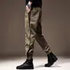 Calça jogger única de corte solto para homens, calça harém, calça de trabalho de marca moderna, design de estilo outono masculino, calça legal e casual com personalidade distinta