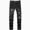 Jeans Rotos de Calle Americana para Hombre Corte Recto Delgado Pantalones de Mendigo Parcheados de Gama Alta Punk Atractivos Casuales Pantalones Largos