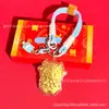 Llavero de flor de dinero de oro macizo de dibujos animados lindo, colgante creativo del año zodiacal, pequeño recuerdo para exposiciones y reuniones anuales, al por mayor