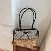 Bolso de hombro de moda con lazo de alto valor 2026 otoño nuevo diseño de nicho elegante y chic bolsa para debajo del brazo estilo ins