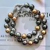 Guofeng Vintage alta calidad Fuerte Ligero Redondo Maillard Cristal Artificial Perla Negra de Tahití Pulsera Pulsera