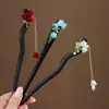 Nuevo Estilo Chino Elegante Tassel de Lirio del Valle Pasador de Pelo Estilo Antiguo Dinastía Han Pasador para Cheongsam Pasador de Madera Imitación Ébano Elegante Adorno para el Cabello para Mujeres