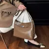 Bolsa Tote de Nicho Estilo Coreano para Mulheres 2026 Nova Tendência Moda Retrô Bolsa de Ombro Transversal Bolsa Kelly de Alta Qualidade