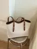 Bolso de diseño tejido de nicho para mujer, bolso de mano grande de moda primavera/verano 2026, bolso de hombro casual de moda