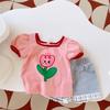 Camiseta Infantil Estilo Novo Verão 2026 para Bebês Meninas, Fashion, Fofa, Camiseta de Manga Curta com Estampa de Flor de Desenho Animado, Versátil e na Moda