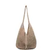 Bolso tejido hueco estilo coreano para mujer, nuevo bolso de mano informal de verano 2026 para vacaciones y viajes, bolso de hombro de gran capacidad