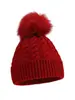 Nuevos estilos de otoño e invierno de gorros de punto trenzado para niños, disponibles en Amazon para ventas transfronterizas, en colores lisos con pompón, que brindan calidez y protección contra el viento.