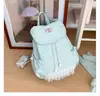 Mochila de nailon de lunares de gran capacidad estilo coreano para mujer, nueva de 2026, mochila pequeña casual de viaje con ribete de encaje
