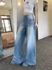 Calça jeans larga estilo americano, lavada e com efeito desgastado, para mulheres, tamanho petite, cintura alta, modelagem que afina, caimento solto, fluida, comprimento até o chão, perna reta
