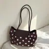 Bolso japonés textura simple bolso de hombro individual coreano gran capacidad 2026 nuevo otoño gamuza axila exquisito