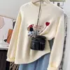 Suéter de punto bordado de color liso para mujer, otoño e invierno 2025, top de punto extremadamente bonito, suave y acogedor, estilo coreano delicado