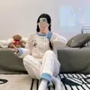 Fábrica fuente pijama nuevo de manga larga de forro polar coral para mujer otoño e invierno franela gruesa invierno conjunto para estar en casa