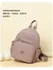 Mochila de gran capacidad para viajes casuales transfronterizos para mujer, tela de nailon a la moda, mochila de una sola pieza para ir al trabajo, envío directo para mujer