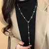 Colección Larga de Collares Superpuestos de Perlas Swarovski para Mujer, Estilo Lujo Ligero, Cadena Versátil para Suéter con un Toque de Alta Gama, Venta al por Mayor Otoño e Invierno