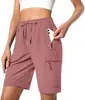 Shorts esportivos leves de secagem rápida para mulheres europeias e americanas, para camping, viagens, golfe, com bolsos com zíper e design casual à prova d'água