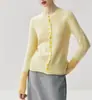 Botões com Senso de Design Cardigã de Tricô Versátil Feminino 2026 Outono/Inverno Novo Estilo Coreano Suéter de Gola Redonda Emagrecedor Valorizador Peça de Exterior