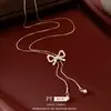 Collar con Colgante Ajustable de Lazo de Zirconia, Exquisito y Versátil, Cadena para Suéter de Estilo Lujo Ligero, Joyería de Nicho de Diseñador para Mujeres